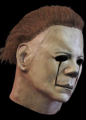 This is a Halloween 2 Michael Myers mask that is white, with brown hair and red blood tears.