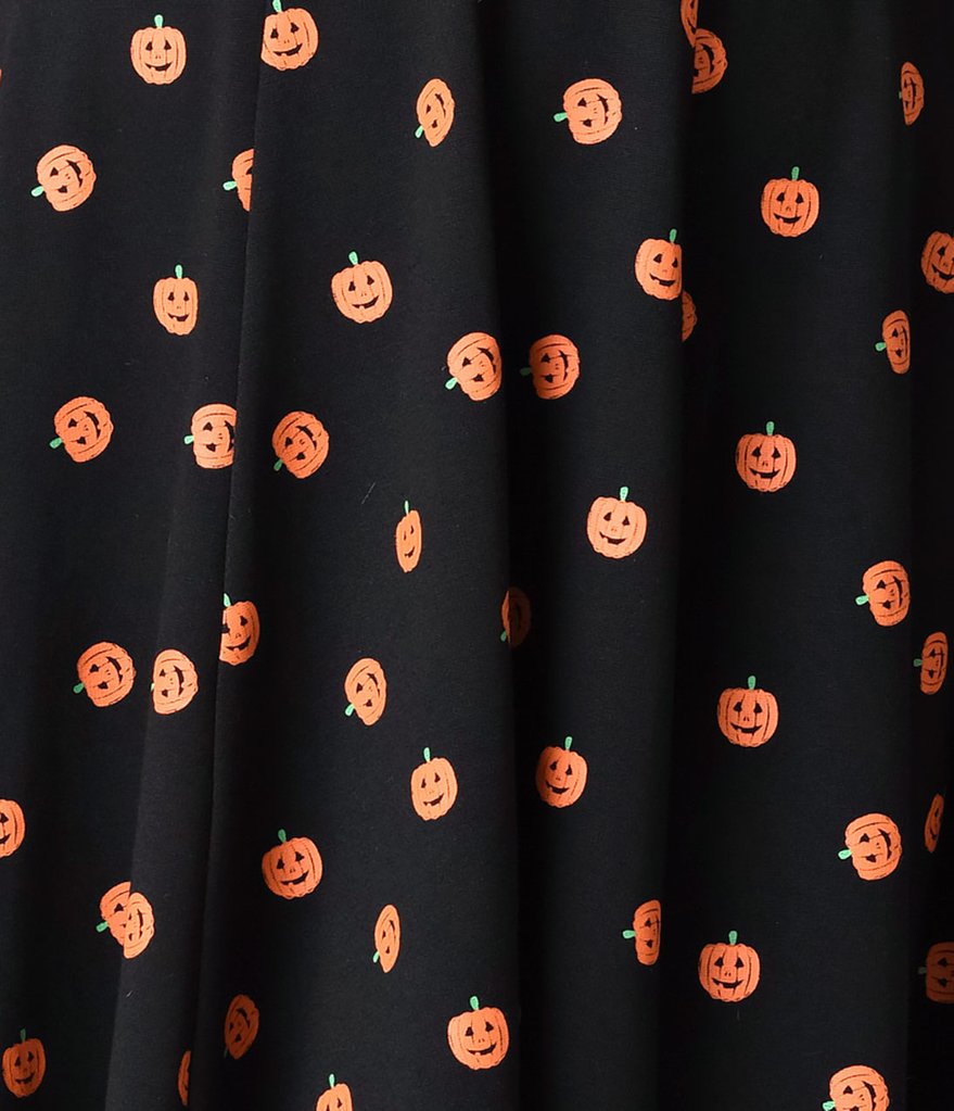 This is a black pinup flare dress with orange pumpkin print.