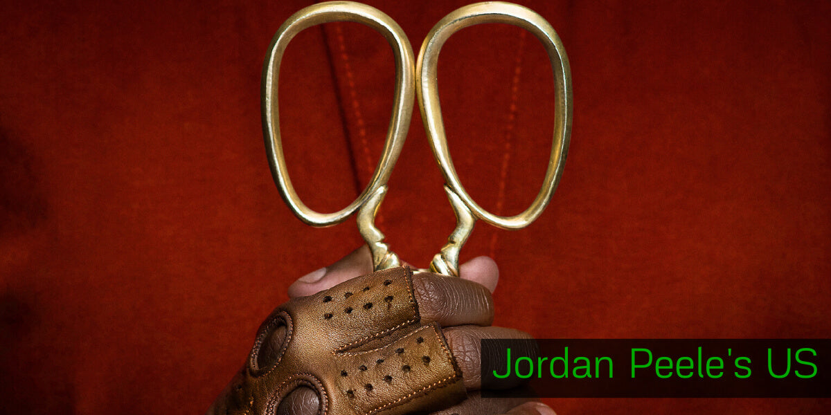 Character from the Jordan Peele US Movie holding scissors
