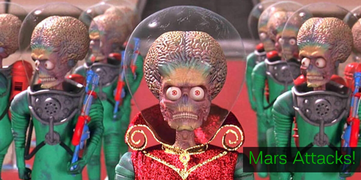 Mars Attacks movie poster with alien martian, a spaceship and a dog with a woman head