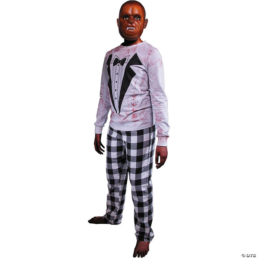 Child wearing a Halloween-themed outfit with a tuxedo design on a white background