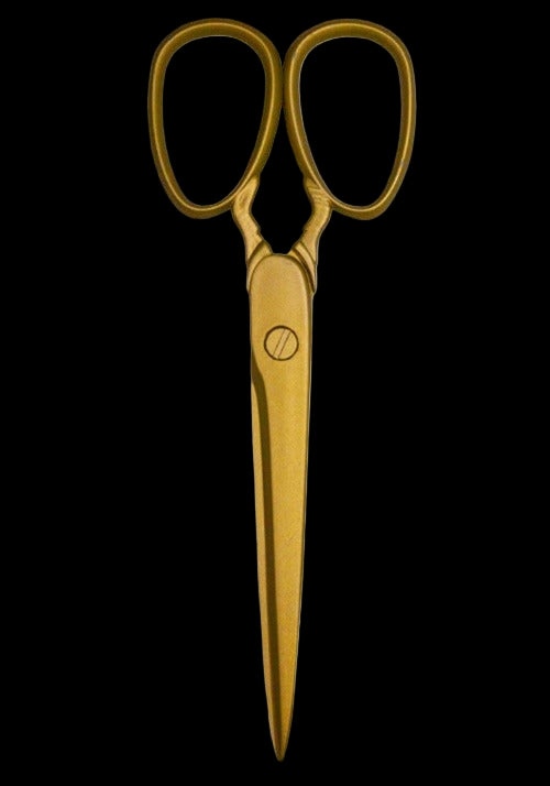 Gold scissors on a white background