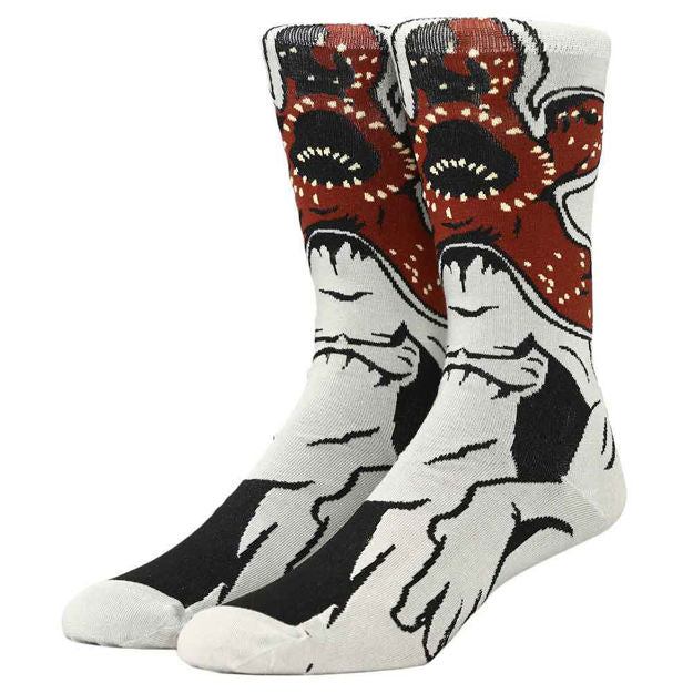 These are Stranger Thins demogorgon socks and they have a red and black monster with teeth on them
