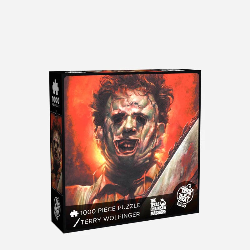 This is a Texas Chainsaw Massacre Leatherface puzzle and he has a flesh mask, brown hair and it is the front of the box