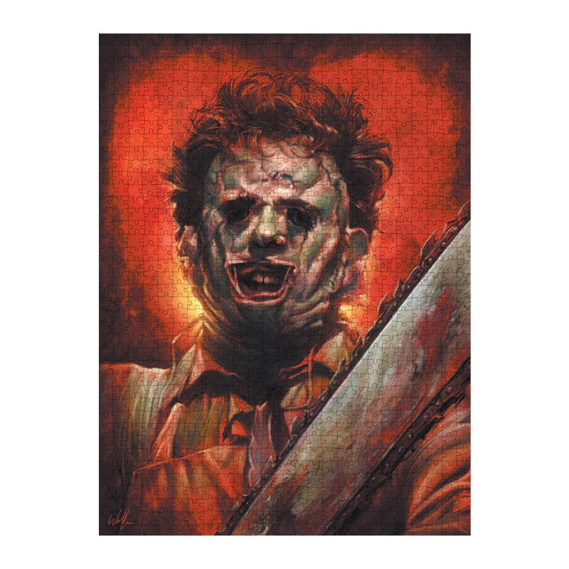 This is a Texas Chainsaw Massacre Leatherface puzzle and he has a flesh mask, brown hair, a silver chainsaw and a tie and apron 