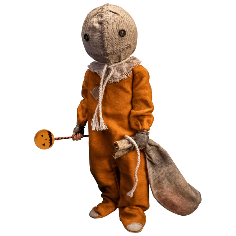 This is a Trick 'T Treat Sam 1:6 scale Figure and he has a burlap mask, orange jumpsuit, bitten lollipop and burlap sack