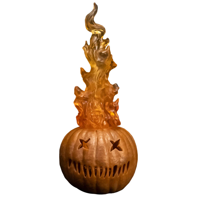 This is a Trick 'T Treat Sam 1:6 scale Figure flaming pumpkin that is orange with x eyes and teeth