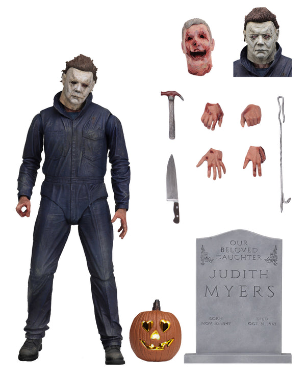 This is a Halloween 2018 Michael Myers NECA 7" ultimate action figure with 4 hands, extra head, tombstone, pumpkin, knife, hammer and severed head.