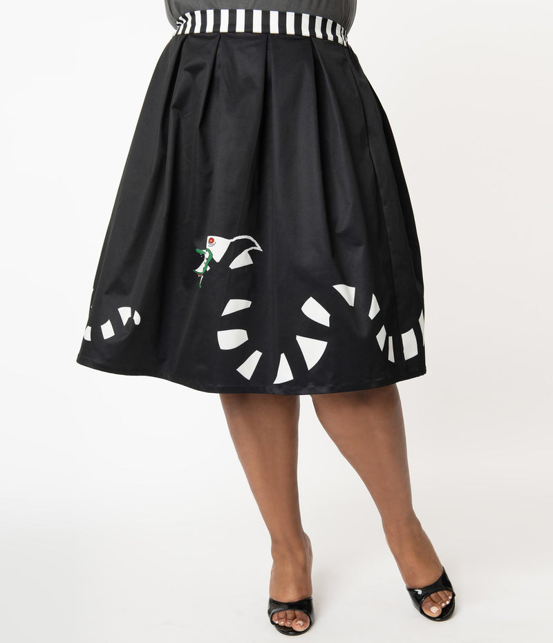 This is a Beetlejuice vintage pinup Sandworm swing skirt from Unique Vintage, that is black with a striped worm and the plus model is wearing black shoes.