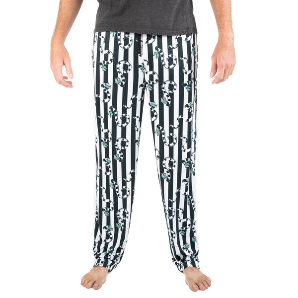 This is a Beetlejuice Sandworm sleep pant pajamas and they are black and white striped, with striped worms with green heads.