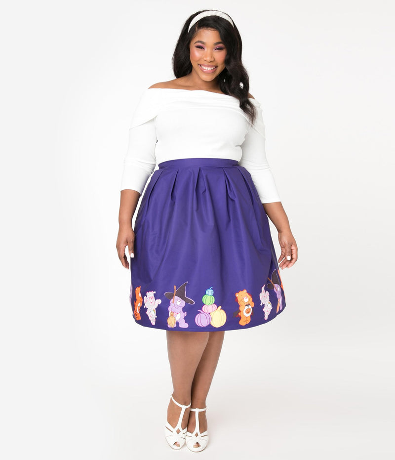This is a Care Bears halloween purple Jayne swing skirt by Unique Vintage and the plus model is wearing a white shirt, white headband and has on white shoes.