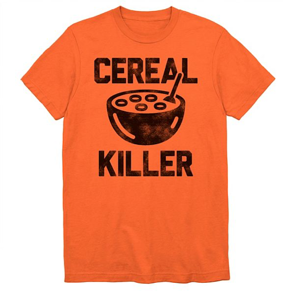 This is an orange t-shirt and it has black letters that say cereal killer and a bowl of cereal with a spoon in it.
