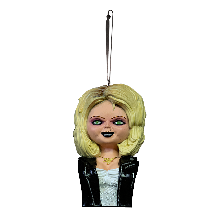 This is a Bride of Chucky Tiffany ornament and she has blonde hair, a gold necklace, a black leather jacket with zippers and a white dress 