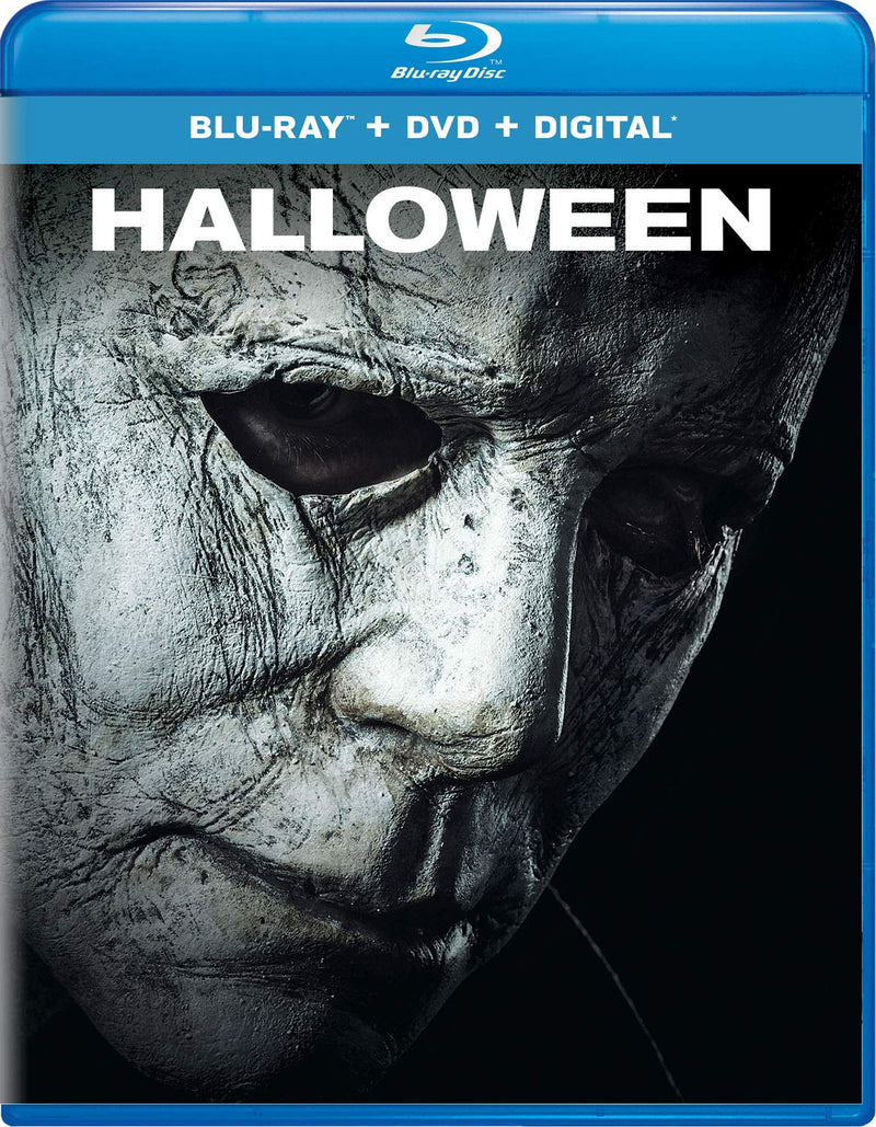 This is an image of Michael Myers in a mask from Halloween 2018 and includes the box art for the Blu-Ray, DVD, Digital Copy and Special and Bonus Features, including deleted and extended scenes.