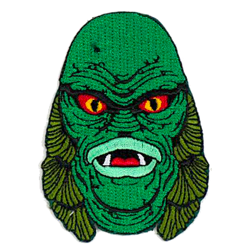 This is a Universal Monsters Creature From the Black Lagoon patch and he has a green face, yellow eyes and gills on the side of his head.
