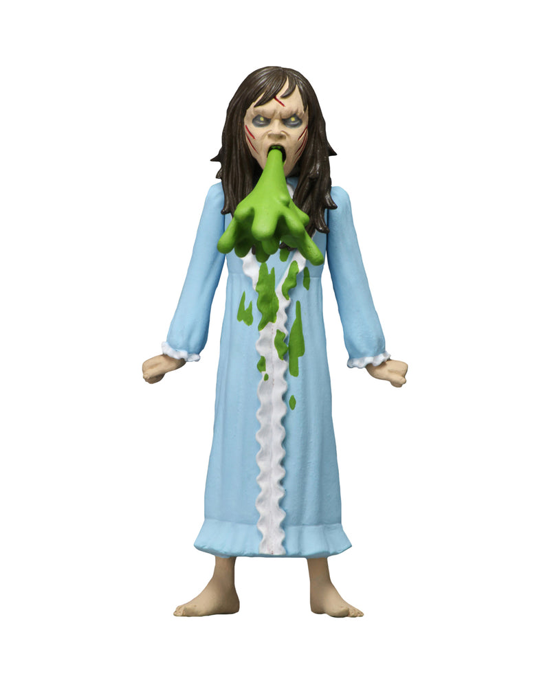 This is the Toony Terrors NECA action figure series 4 Regan from The Exorcist and she has a blue nightgown and she is vomiting green vomit and she has brown hair.