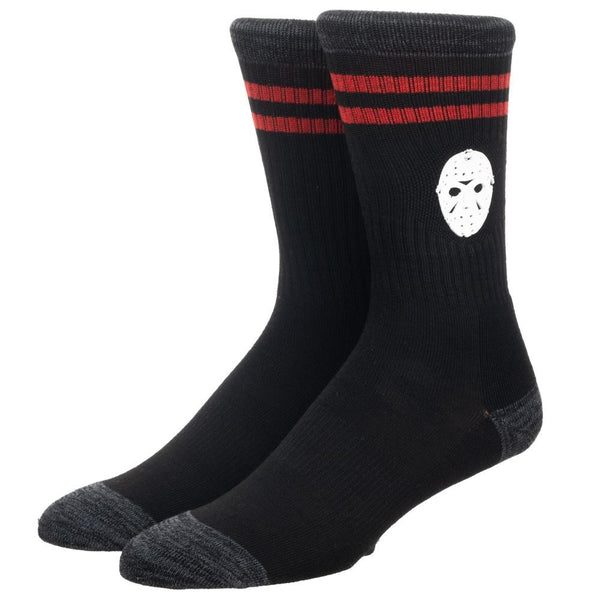 This is a pair of Friday the 13th Jason Voorhees crew socks and they are black with two red stripes and they have a hockey mask on them.