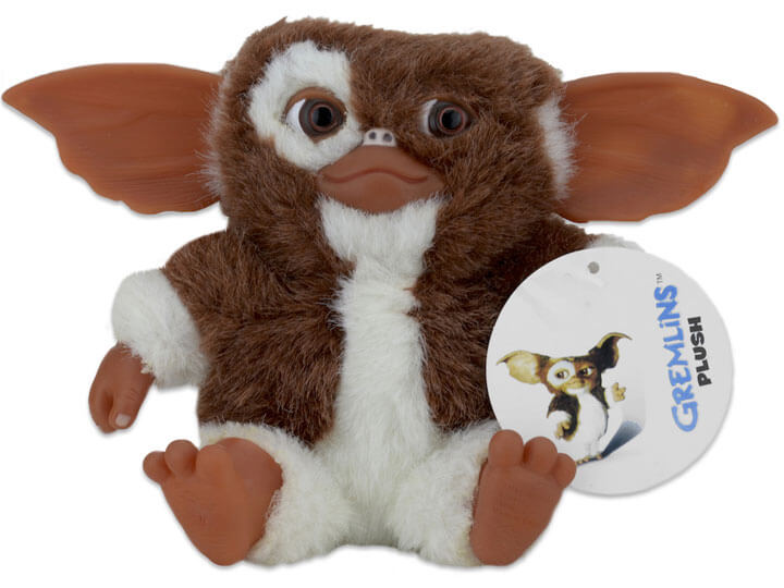 This is a fuzzy NECA 6" plush of Gremlins Gizmo and he is brown and white with tan, hard ears, hands, feet and nose.