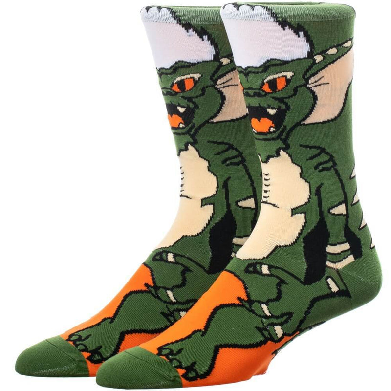 This is a pair of Gremlins Spike 360 printed socks and he is green with white spikey hair.