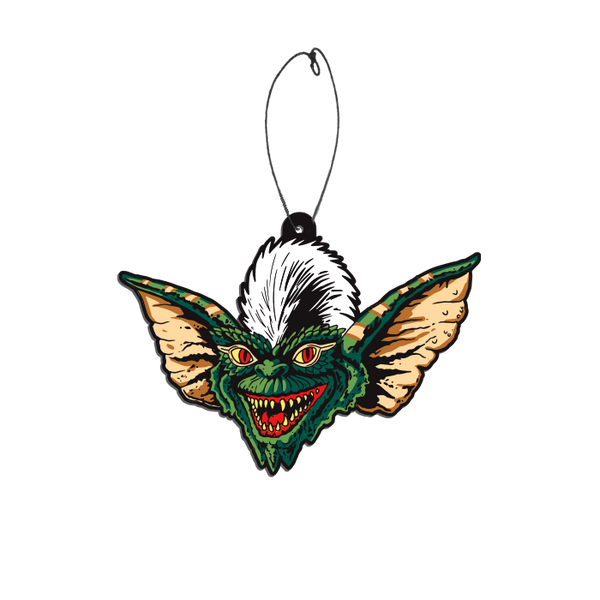 This is a Gremlins Stripe air freshener and he is green with pointy teeth and w white stripe in his hair.