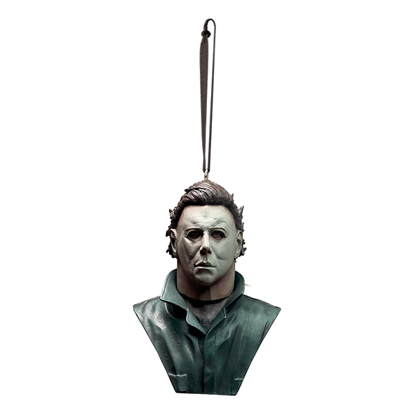 This is a Halloween 1978 Michael Myers ornament and he has a white mask, brown hair and green coveralls