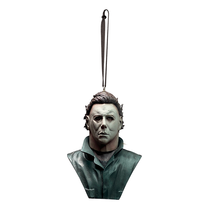 This is a Halloween 1978 Michael Myers ornament and he has a white mask, brown hair and green coveralls