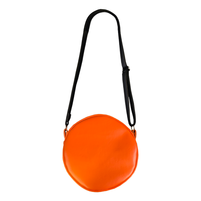 This is a Halloween 1978 pumpkin purse that is orange with a black strap.