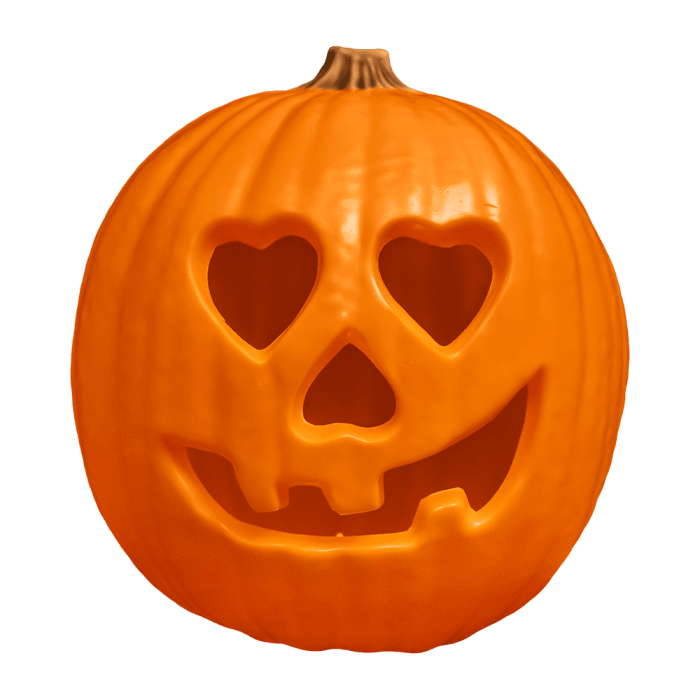 This is a Halloween 2018 light up pumpkin prop that is orange, has heart eyes and cutout nose and mouth.
