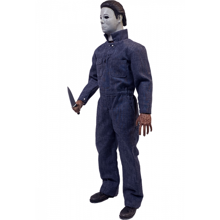 This is a Halloween 4 Return of Michael Myers Trick Or Treat Action Figure and he has a white mask, blue coveralls, black boots and a silver knife.