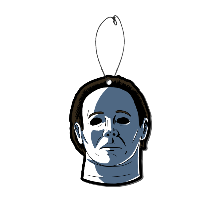 This is a Halloween 4 Return of Michael Myers air freshener and he has a white face, brown hair and black eyes.