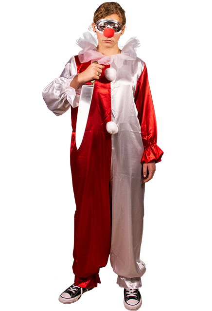 This is a woman in a Halloween 4 Return of Michael Myers Jaime Lloyd Halloween costume that is red and white with white balls, a mask with a red nose and she has a knife in her hand.
