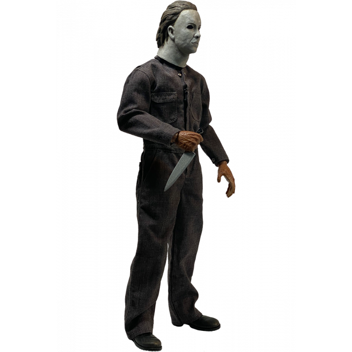 This is a Halloween 5 Revenge of Michael Myers Trick Or Treat Action Figure and he has a white mask, grey coveralls, black boots, burnt hand that are holding a silver knife.  