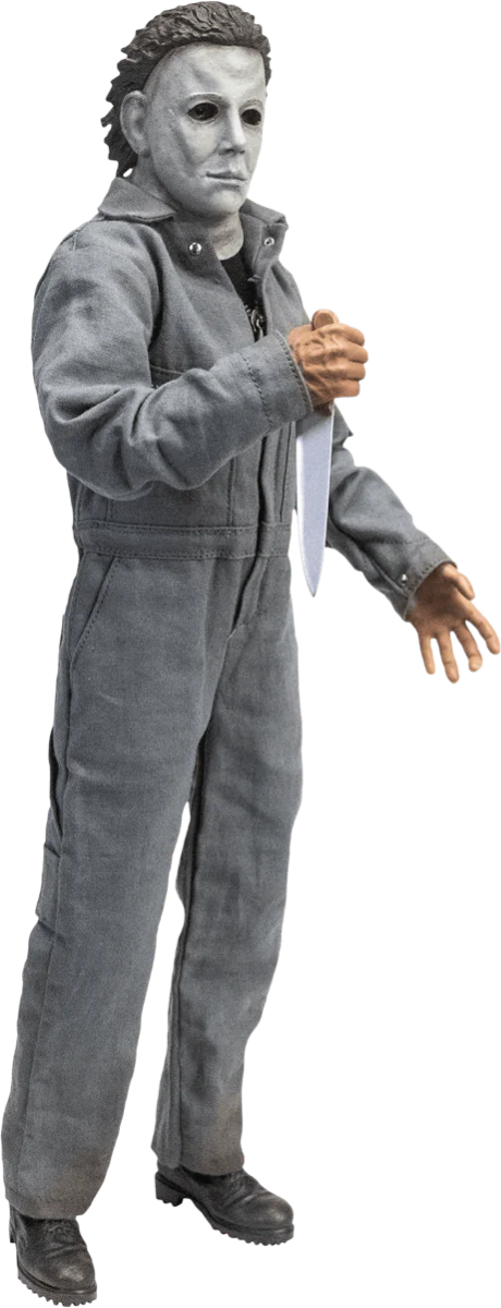 This is a Halloween 6 Curse of Michael Myers 12' action figure set and he is wearing a white mask with brown hair and grey coveralls, black boots and he is holding a knife with a brown handle