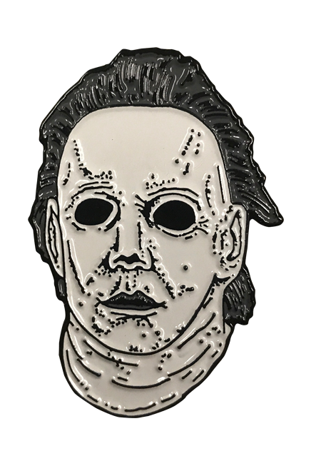 This is a Michael Myers enamel pin from Halloween 6 and it is a white face with brown hair and black eyes.