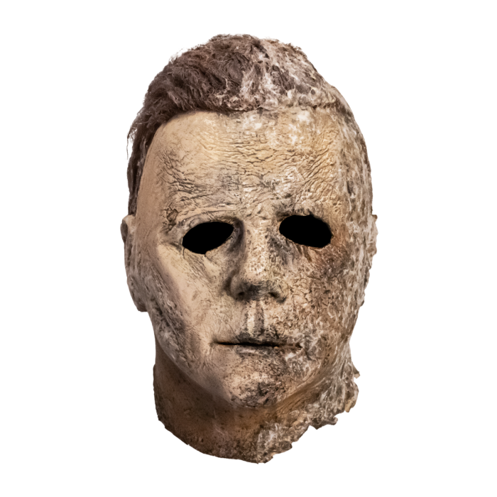 This is a Halloween Ends Michael Myers mask with brown hair and cut out eyes.