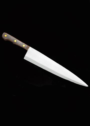 This is a Halloween II Michael Myers Butcher Knife that is foam and has a silver beveled blade and a brown handle with three gold dots.