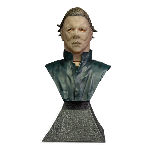 This is a Halloween II Michael Myers mini bust and he is wearing a mask, has brown hair and blue coveralls.