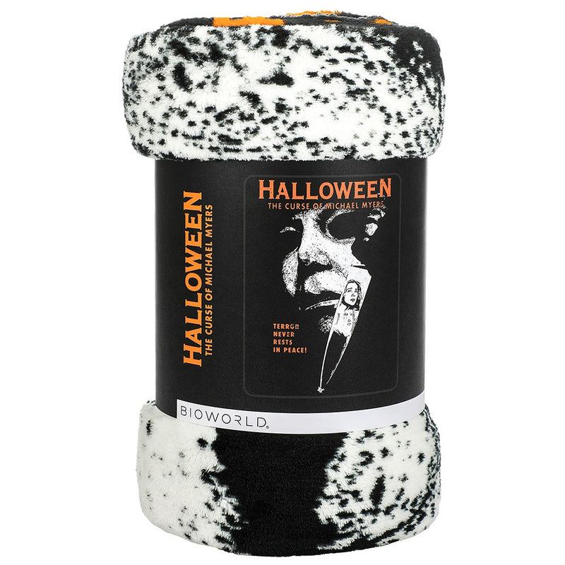 This is a Halloween 6 Curse of Michael Myers fleece throw that is black and orange and rolled up.