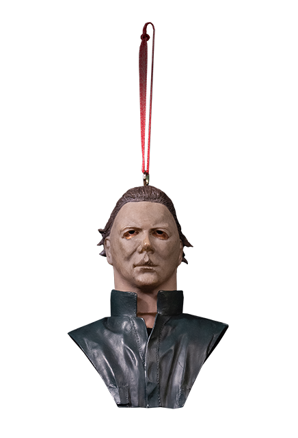 This is a Halloween II Michael Myers Christmas Ornament that has a white mask, green blue coveralls and a red ribbon hanger.