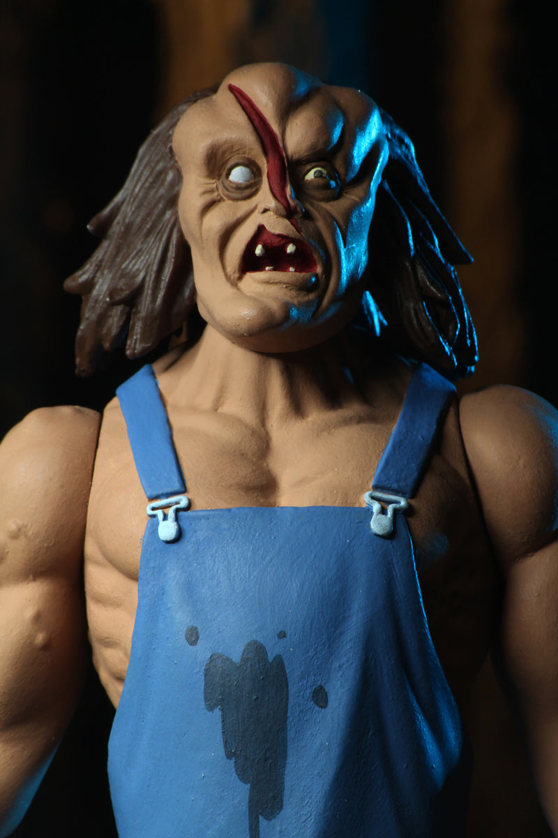 This is the Toony Terrors NECA action figure series 4 Hatchet with blue overalls and he has a slash on his face and he has brown hair.