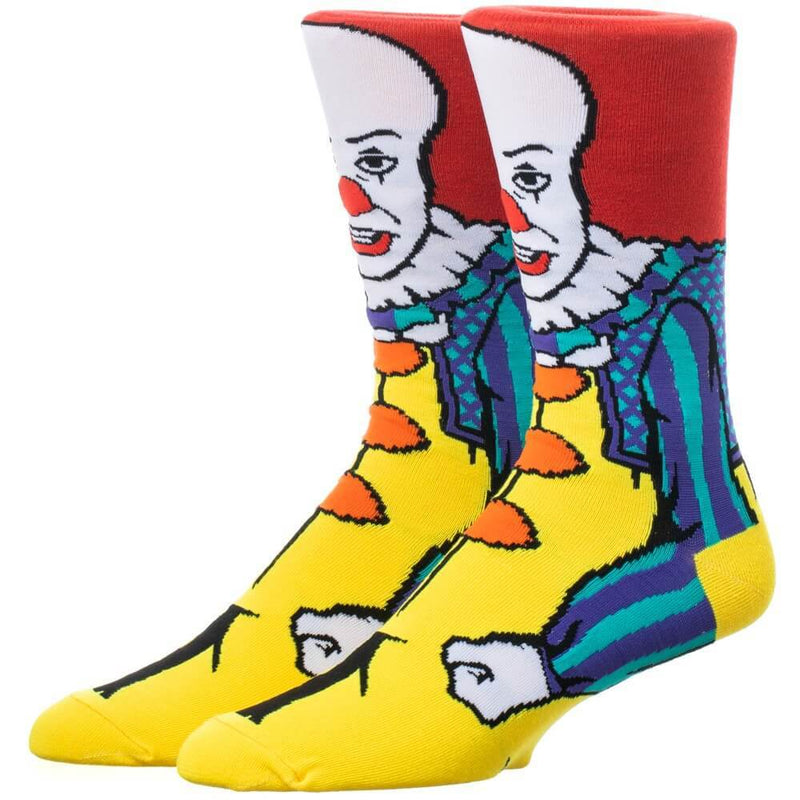 This is a pair of It 1990 Pennywise crew socks and he has red hair, a red nose, yellow clown suit and they are printed 360.