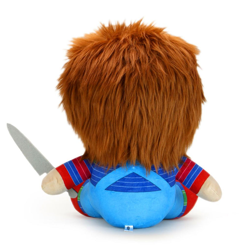 This is a Child's Play Chucky Kidrobot HugMe vibrating plush and he has a striped shirt, red shoes, orange hair and is holding a silver knife.