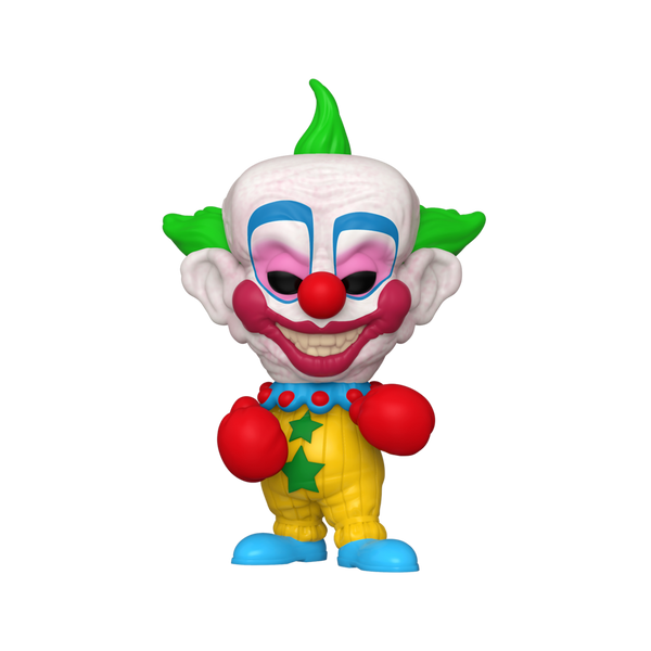 This is a Killer Klowns From Outer Space Pop Funko vinyl and Shorty has three green spikes for hair, a clown face with black eyes and red lips and nose and is wearing a yellow suit with two green stars, blue shoes and red boxing gloves.