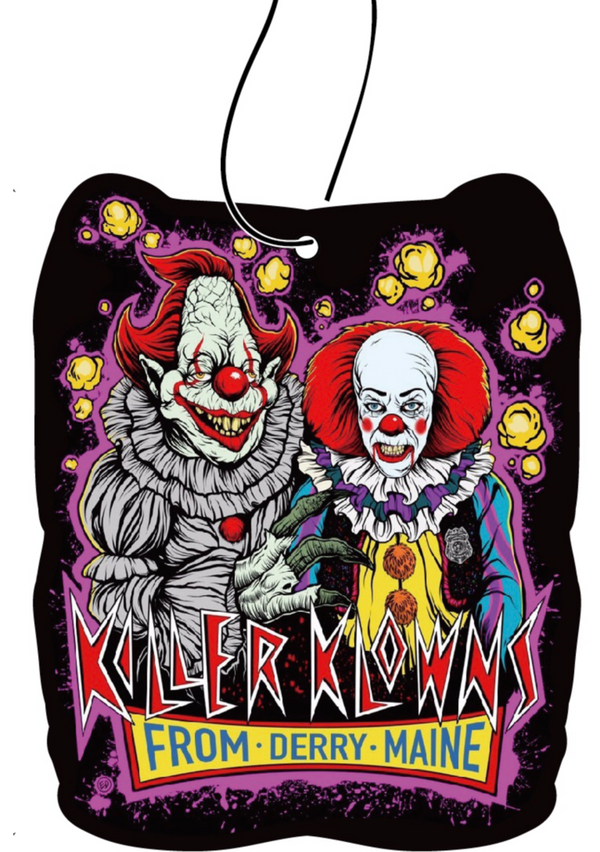 This is a Killer Klowns From Outer Space air freshener and it has two clowns with red hair and noses and popcorn.