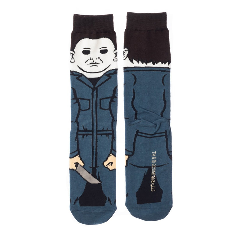 This is a pair of Halloween Michael Myers 360 crew socks and he has on blue overalls, a white mask with brown hair and is holding a knife.