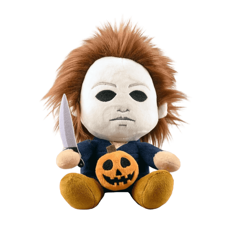 This is the front of a Kidrobot Halloween Michael Myers Phunny stuffed plush that has a white face, brown hair, blue coveralls, a silver knife and orange pumpkin.