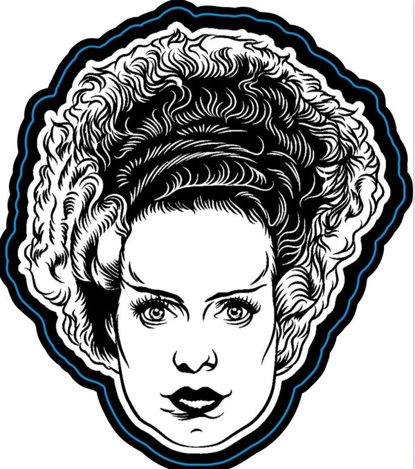 This is a Universal Monsters Bride of Frankenstein face die cut magnet and she has black and white hair.
