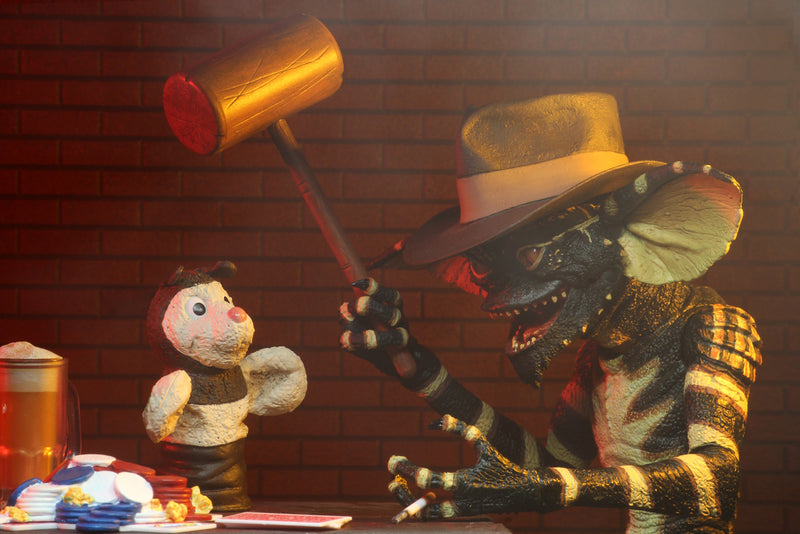 This is a NECA Gremlins flasher ultimate action figure with brown hat, brown mallet, beer and poker chips.