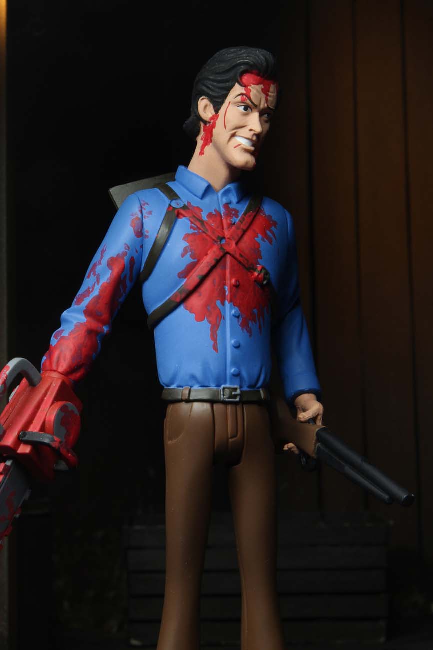 This is NECA Toony Terror Series 5 Evil Dead 2 Ash Williams and he has a bloody chainsaw, brown pants and a blue shirt and he is holding a gun.