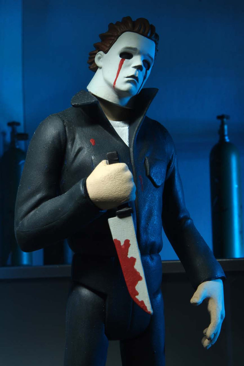 This is NECA Toony Terror Series 5 Halloween 2 Michael Myers and he has w white mask with blood tears and is holding a bloody knife and wearing coveralls.